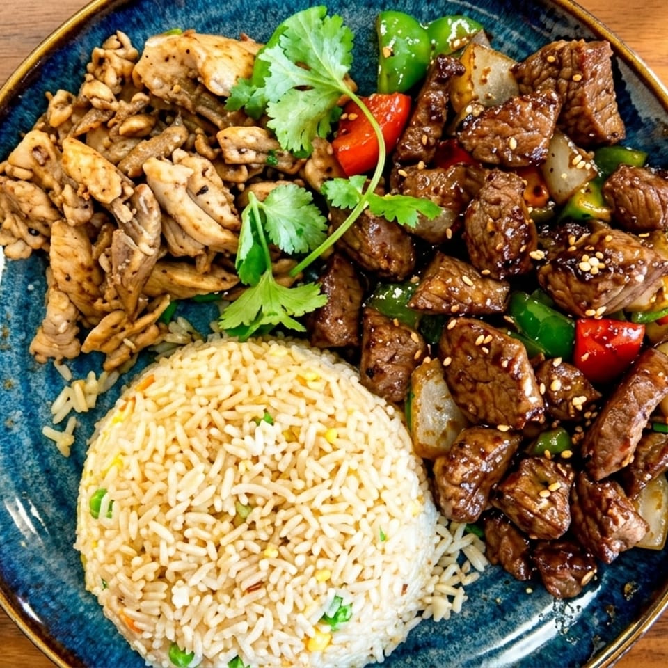 A blue plate with fried rice, grilled chicken, and beef stir-fry with peppers and onions.
